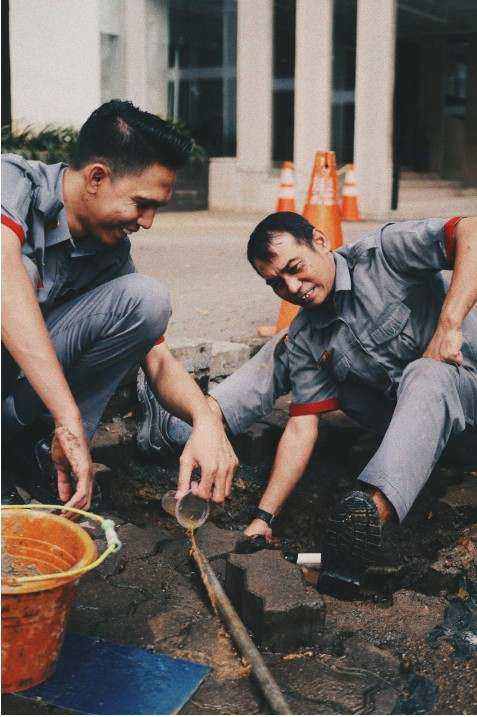 Office repair technicians at work